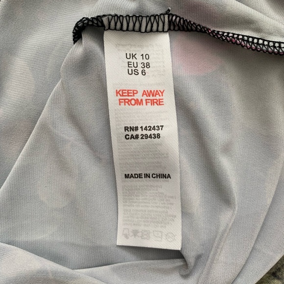 Girls on Film Body-Conscious Dress in Chevron Mix Print - Picture 5 of 7